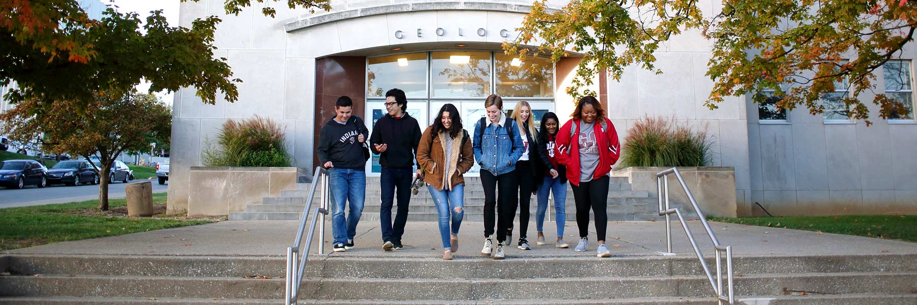 Students walking down Geology building steps.